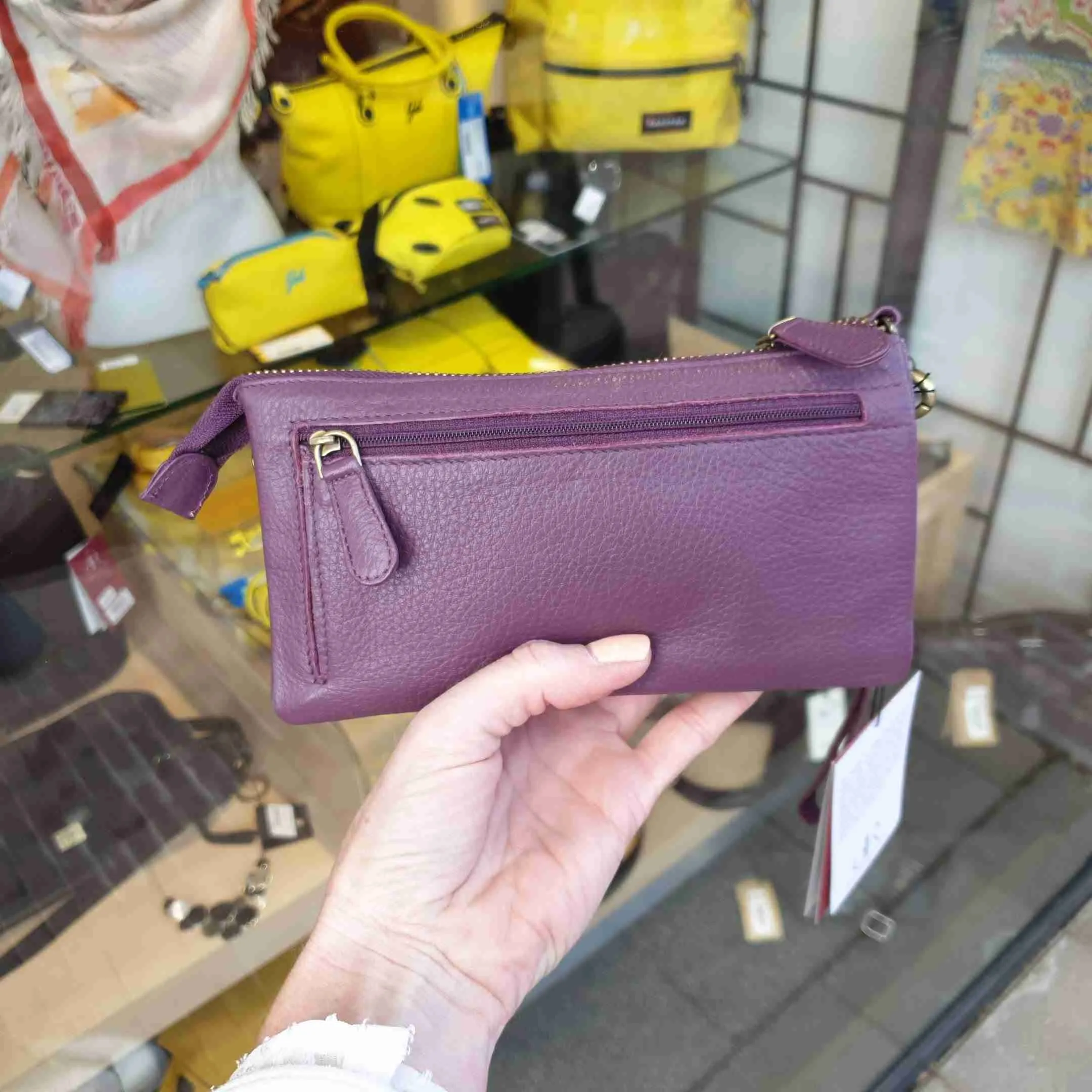 Paarse leren clutch veel vakjes DR Amsterdam